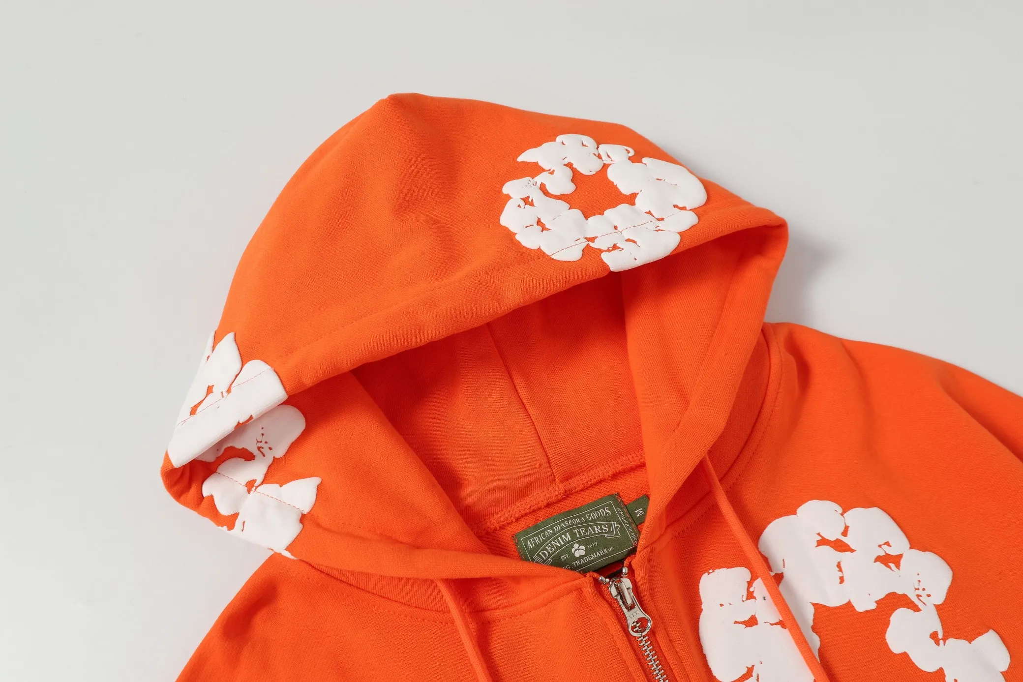 16 colors DENIM TEARS Kapok European and American trendy brand high-quality foam printed hooded sweatshirt jacket. Terry fabric weighs 380 grams. Threads are customized and dyed in the same color. Color Black Gray Blue Green Royal Blue Purple Red Orange Colorful Blue Pink White Sky Blue Brown Carbon Gray Black Gray White White Size S-XL